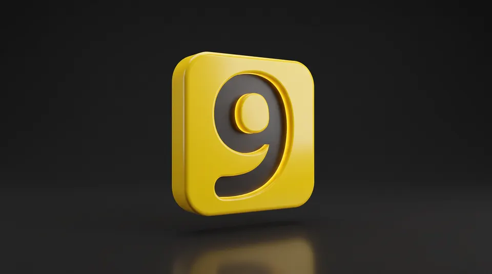Bloco amarelo da Two9 em 3D com o 9 em baixo relevo